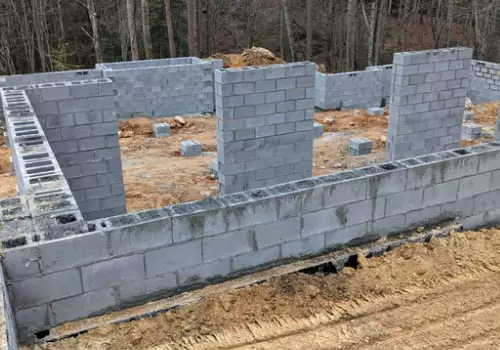 A foundation is seen under construction. Basement Systems Waterproofing & Foundation is a foundation contractor.