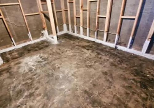 A basement is seen in the midst of repair, such as those performed by Heartland, Basement Contractors in Peoria IL.