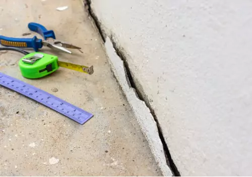 A stairstep crack requiring Foundation Crack Repair in Peoria IL