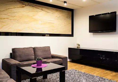 Pictured is a finished basement, such as Basement Contractors in Bloomington IL like Heartland build.